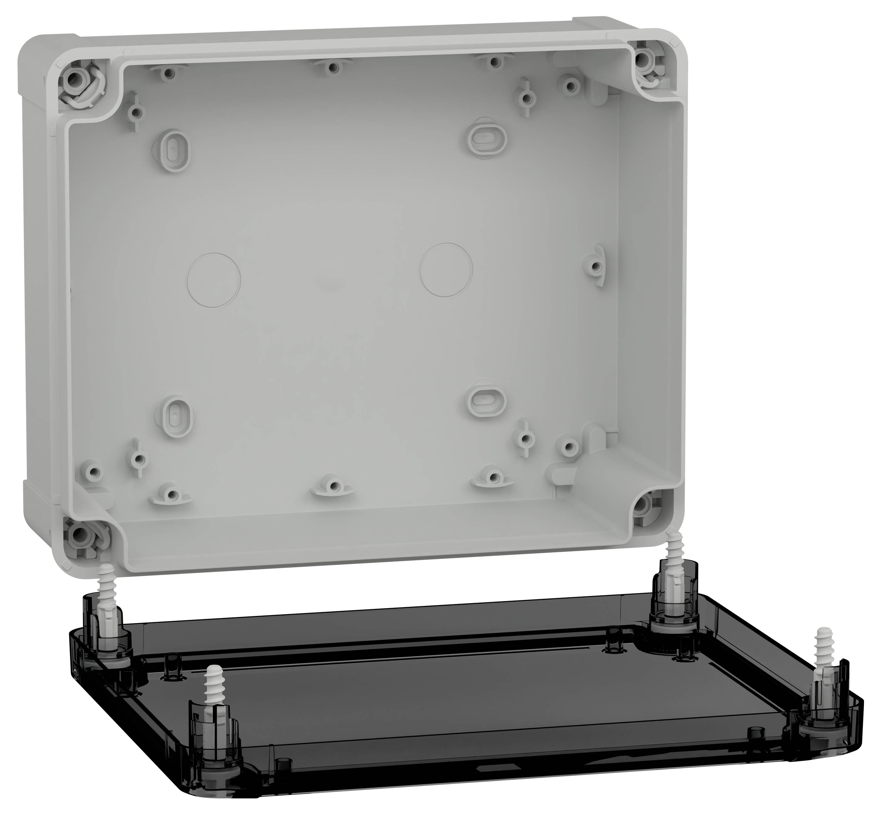 Szara skrzynka elektryczna z odkręconą czarną pokrywą, ukazująca otwory montażowe i punkty wprowadzenia kabli wewnątrz.
