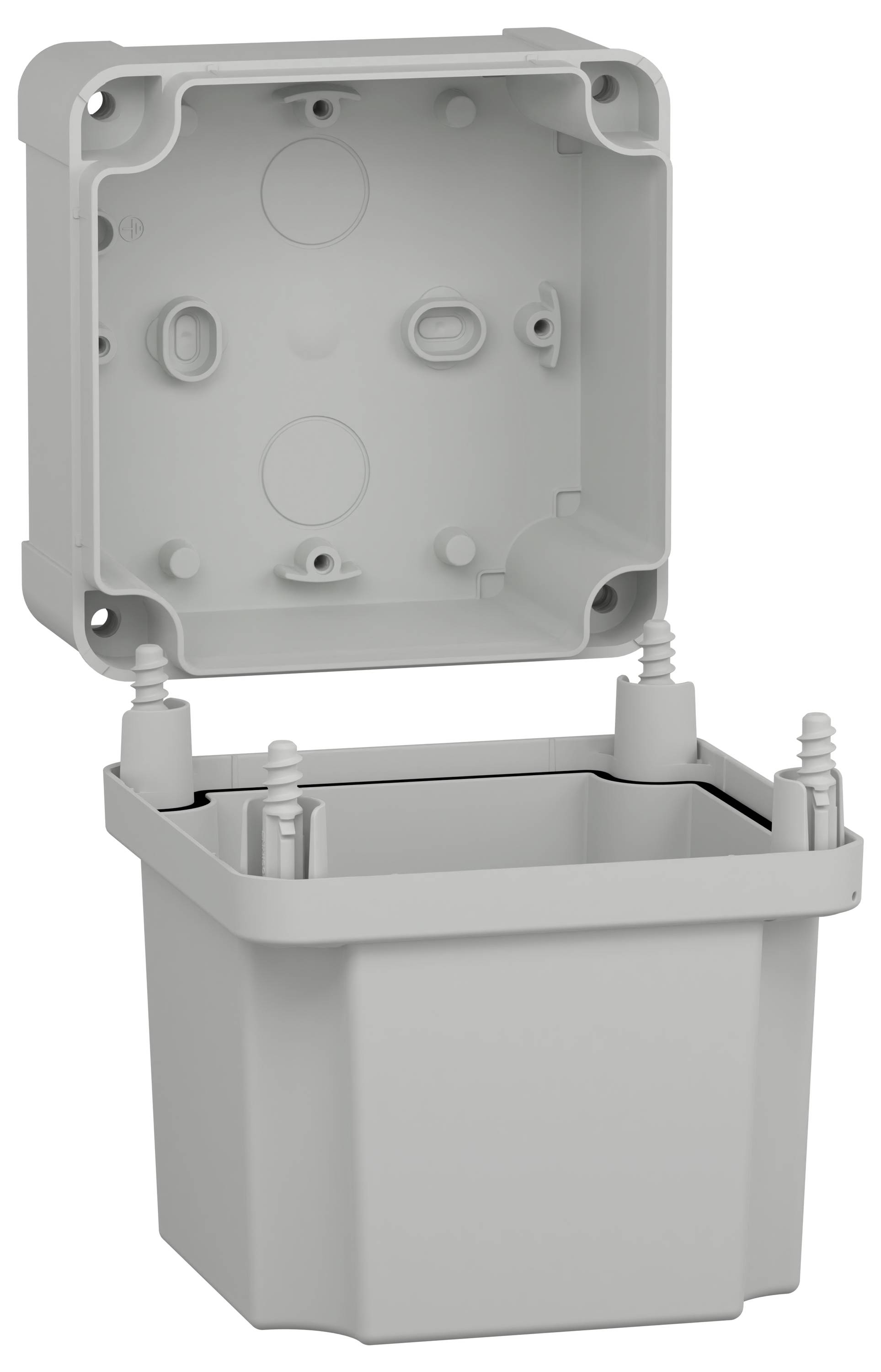 Szara skrzynka elektryczna z otwartą pokrywą, prezentująca wiele portów kablowych i punktów montażowych wewnątrz, służąca do zabezpieczania połączeń elektrycznych.