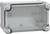 Prostokątne, szare elektryczne pudełko rozdzielcze z przezroczystą pokrywą i zaokrąglonymi narożnikami, z widocznymi otworami montażowymi na śruby oraz punktami wprowadzania kabli.
