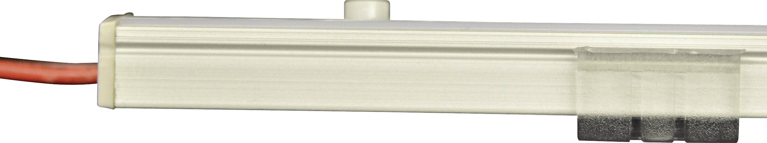 Srebrne urządzenie elektroniczne z czerwonym przewodem, przedstawiające złącze i małą wystającą komponente.