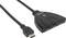 Potrójna rozdzielnica HDMI firmy Manhattan z obsługą 4K. Jeden kabel HDMI jest podłączony, widoczne są trzy porty wejściowe.