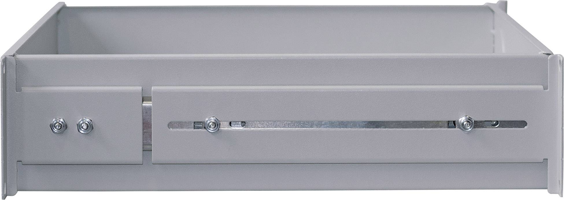 Szara, kwadratowa metalowa szuflada leżąca płasko. Widoczne są w niej śruby i prowadnice do zamocowania.