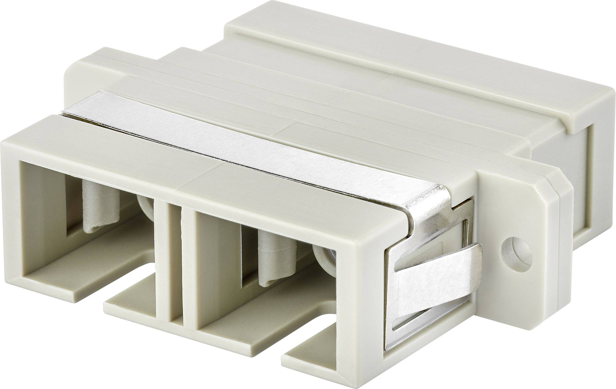 Widoczny jest jasnoszary, prostokątny złącz elektryczny z metalowymi stykami na białym tle.