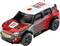 Zabawkowy samochód wyścigowy w stylu rajdowym z napisem 'REV 011' na masce i boku. Główne kolory to czerwony, biały i czarny.