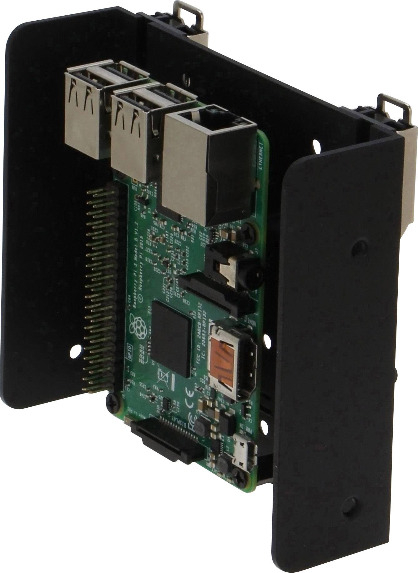 Moduł minikomputera Raspberry Pi z wieloma portami USB i złączem HDMI, umieszczony w czarnej obudowie.