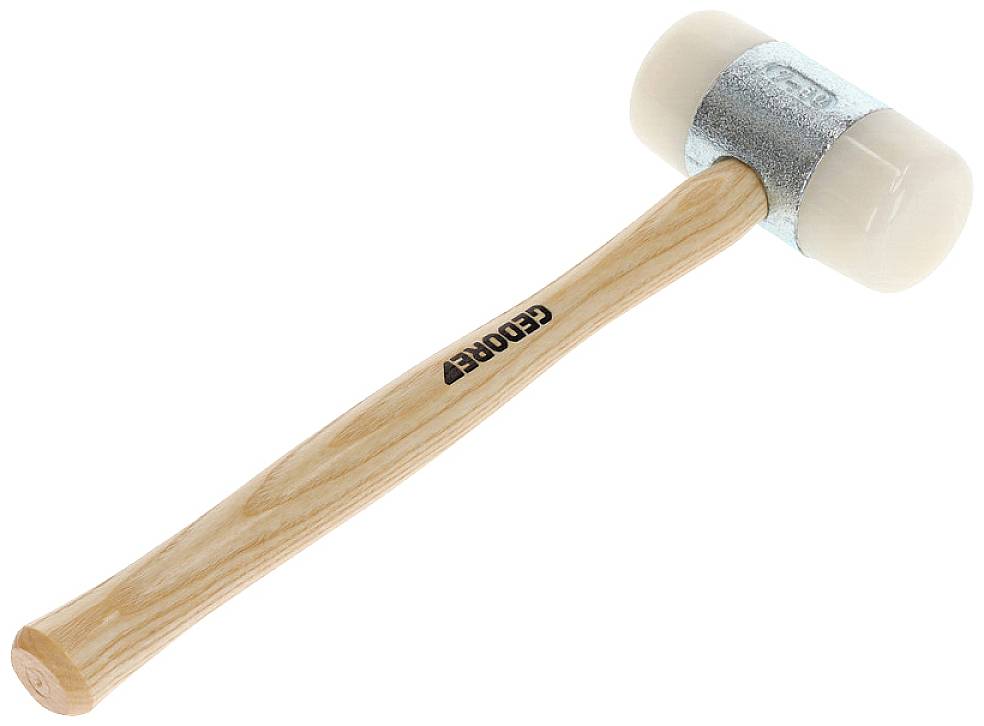 Młotek gumowy z drewnianą rączką, przydatny do lekkich prac montażowych lub mocowania delikatnych materiałów bez ich uszkodzenia.