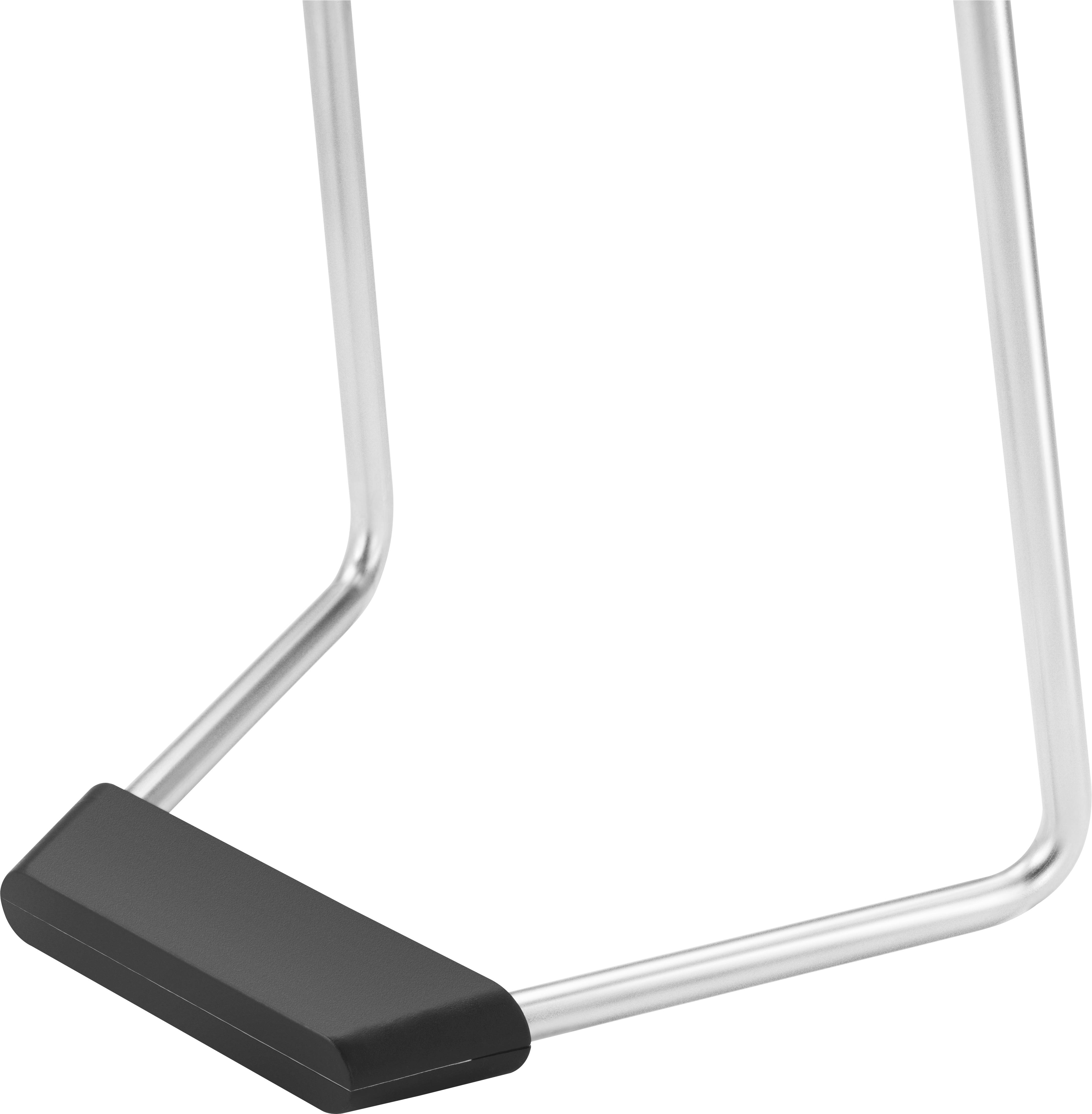 Fragment mebla z metalowymi nogami i czarną plastikową podstawą.