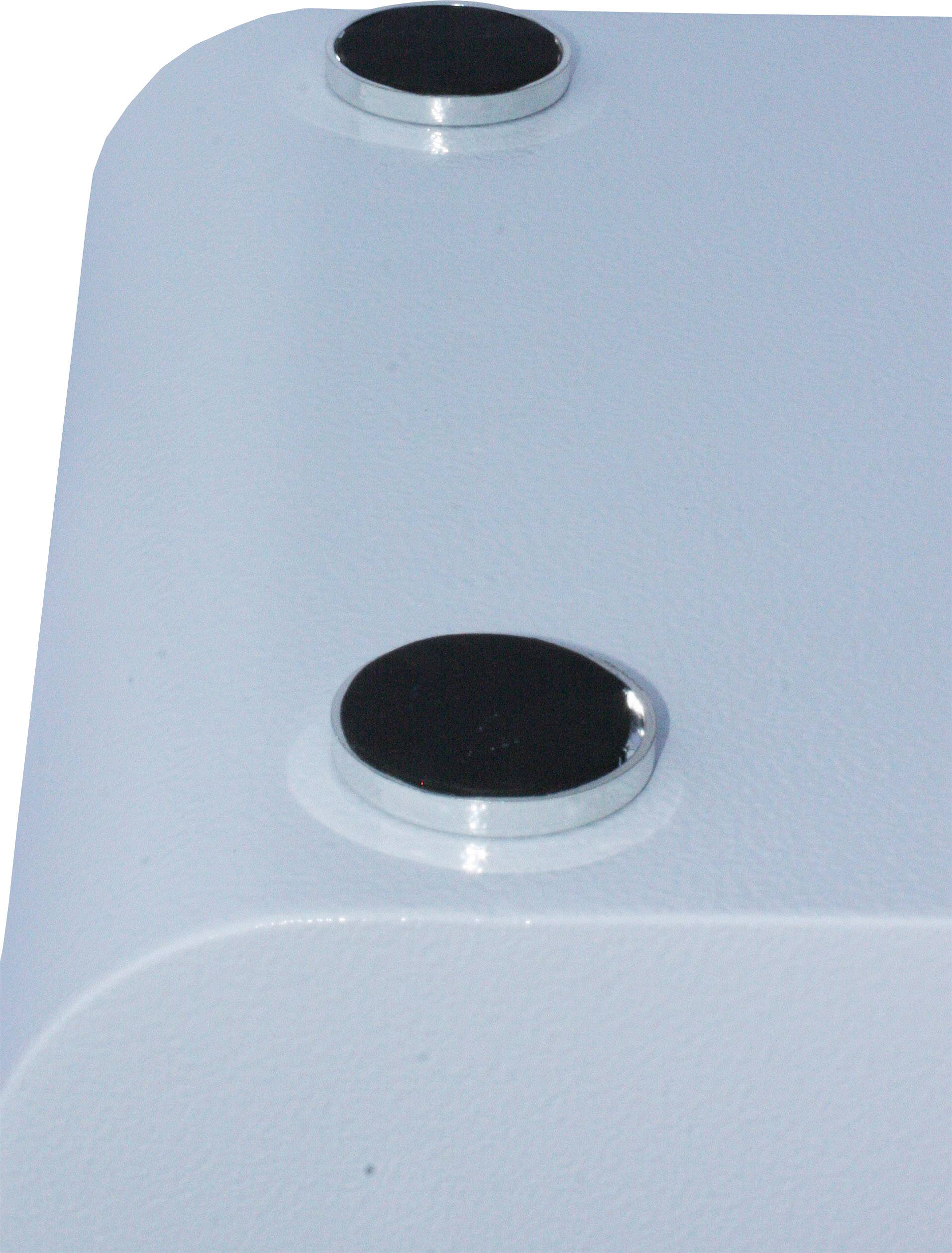 Dwa czarne, okrągłe magnesy na niebieskiej metalowej powierzchni.