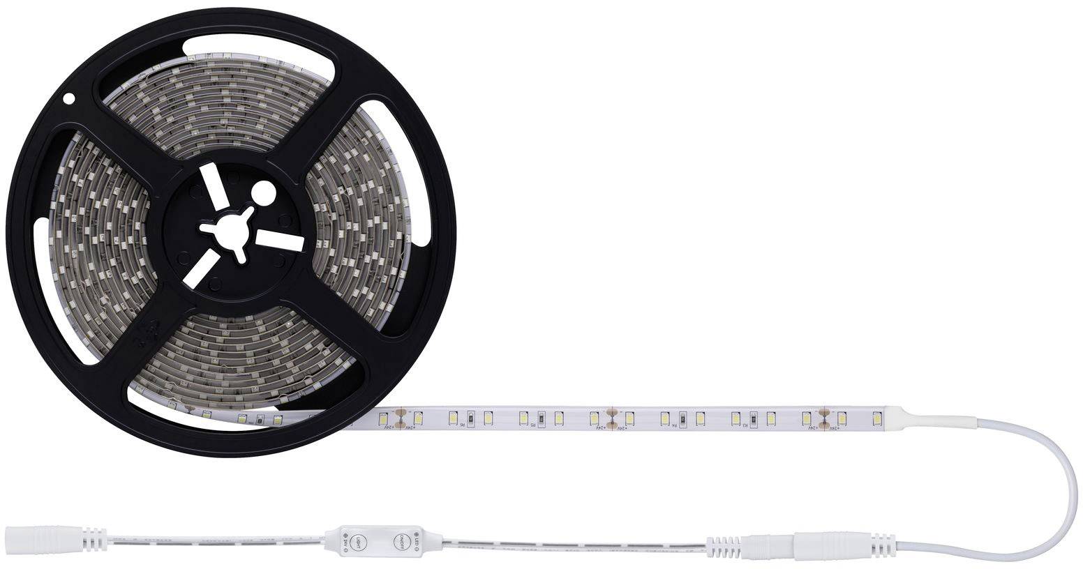 Zwinięty pas świetlny LED spoczywa na czarnej rolce plastikowej. Część taśmy jest rozwinięta, a biały przewód jest zamocowany.