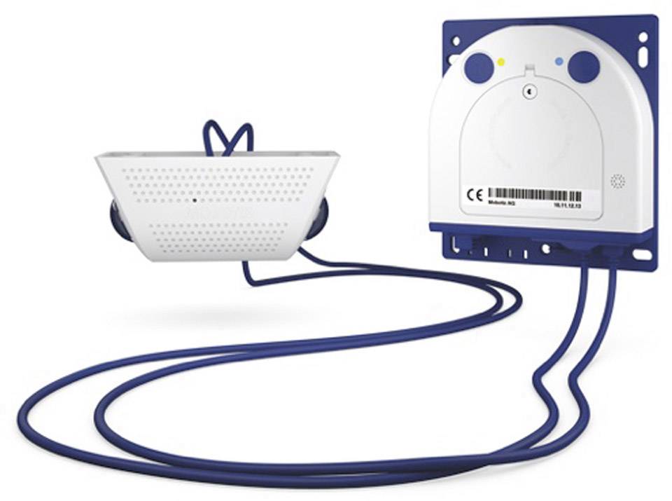 Elektroniczne urządzenie z dwoma podłączonymi niebieskimi kablami. Po lewej stronie prostokątny moduł, po prawej okrągły element.