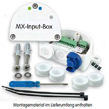 Pudełko 'MX-Input-Box' z osprzętem montażowym, śrubami, kołkami, wkrętakiem i opaskami zaciskowymi. Oznaczone napisem 'Akcesoria montażowe zawarte w zestawie'.