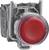 Czerwony przycisk naciskowy w metalowej obudowie, często stosowany w sterowaniu maszynami do funkcji zatrzymania awaryjnego.