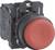 Czerwony przycisk wciskany z czarną obudową, typowo stosowany jako wyłącznik awaryjny w urządzeniach przemysłowych do wyłączania w sytuacjach bezpieczeństwa.