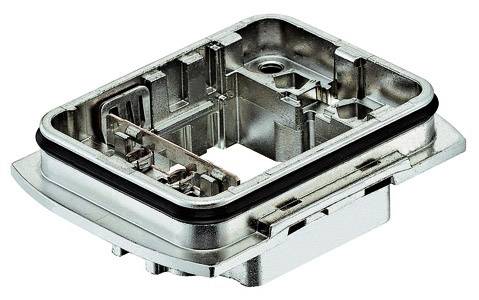 Metalowy element z prostokątną ramą i kilkoma zagłębieniami, prawdopodobnie obudowa lub uchwyt do komponentów technicznych.
