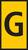 Żółty prostokątny znak z dużą czarną literą 'G' pośrodku.