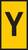 Żółta tablica z dużą, czarną literą 'Y' pośrodku.