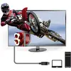 Motocyklista wyskakuje z telewizora 3D. Symbol technologii trójwymiarowej. Pokazane przewody podłączeniowe do komputera.