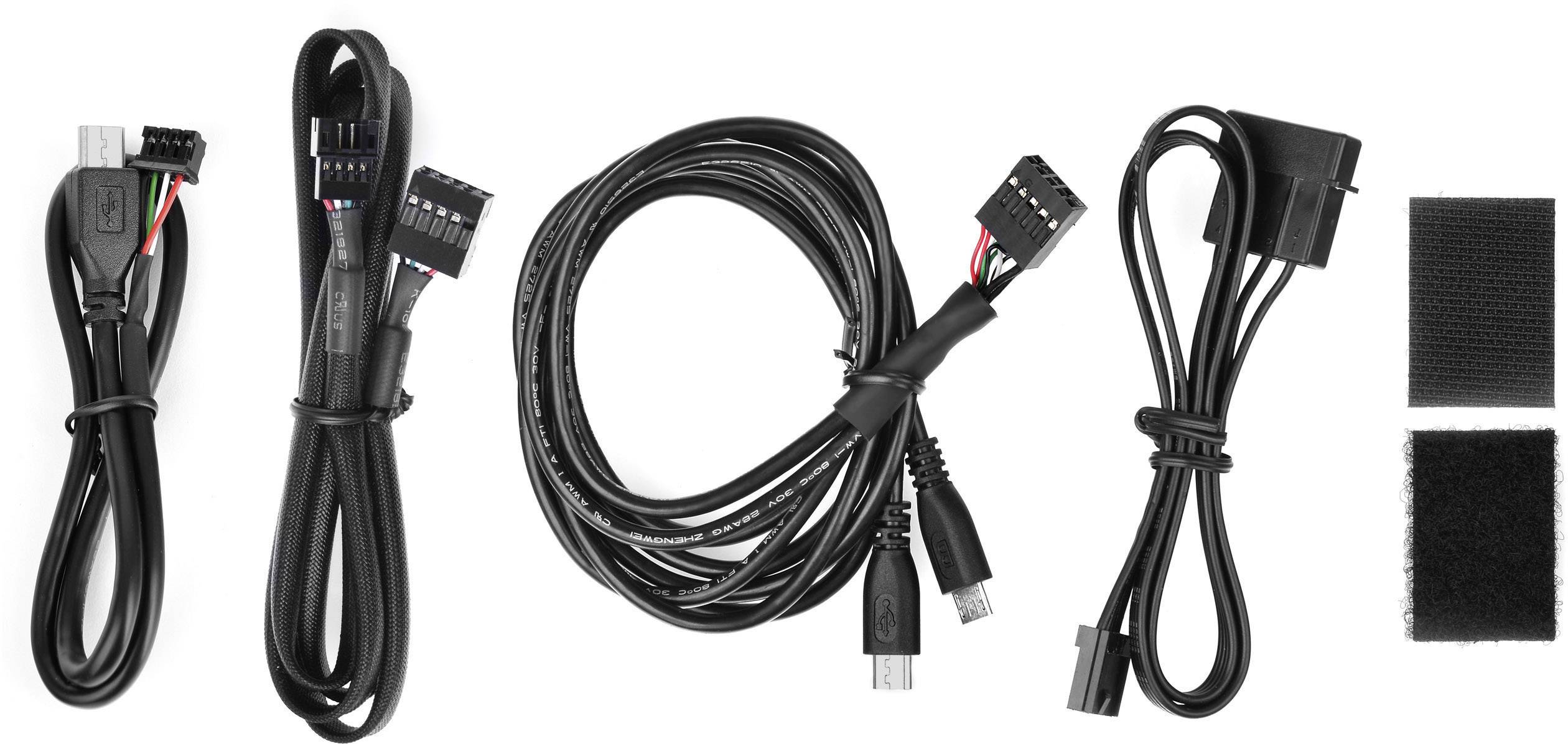 Cztery różne kable i dwie opaski rzepowe ułożone obok siebie. Po lewej stronie kabel USB, po prawej kabel zasilający.