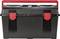 Czarny skrzynka narzędziowa z czerwonym uchwytem i czerwonymi zamknięciami.