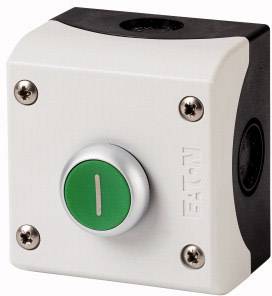 Białe plastikowe obudowa z zielonym przyciskiem z przodu, oznaczona napisem 'EATON'.