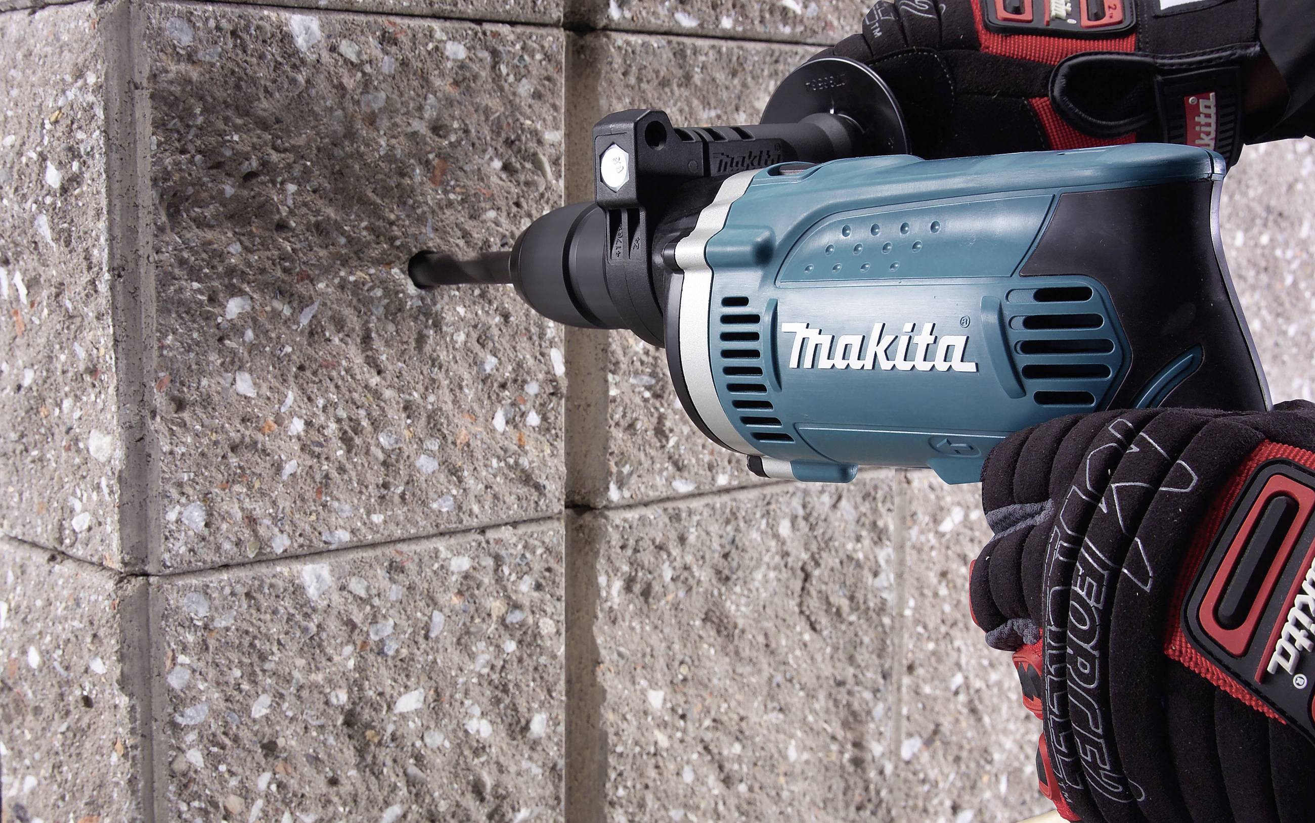 Ударний дриль Makita HP1631KX3 з 1 швидкістю, 710 Вт, включаючи аксесуари, включно з кейсом