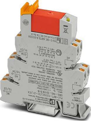 Szary elektryczny przekaźnik z pomarańczowym przełącznikiem na górnej powierzchni, nadrukowany informacjami technicznymi i certyfikatami.
