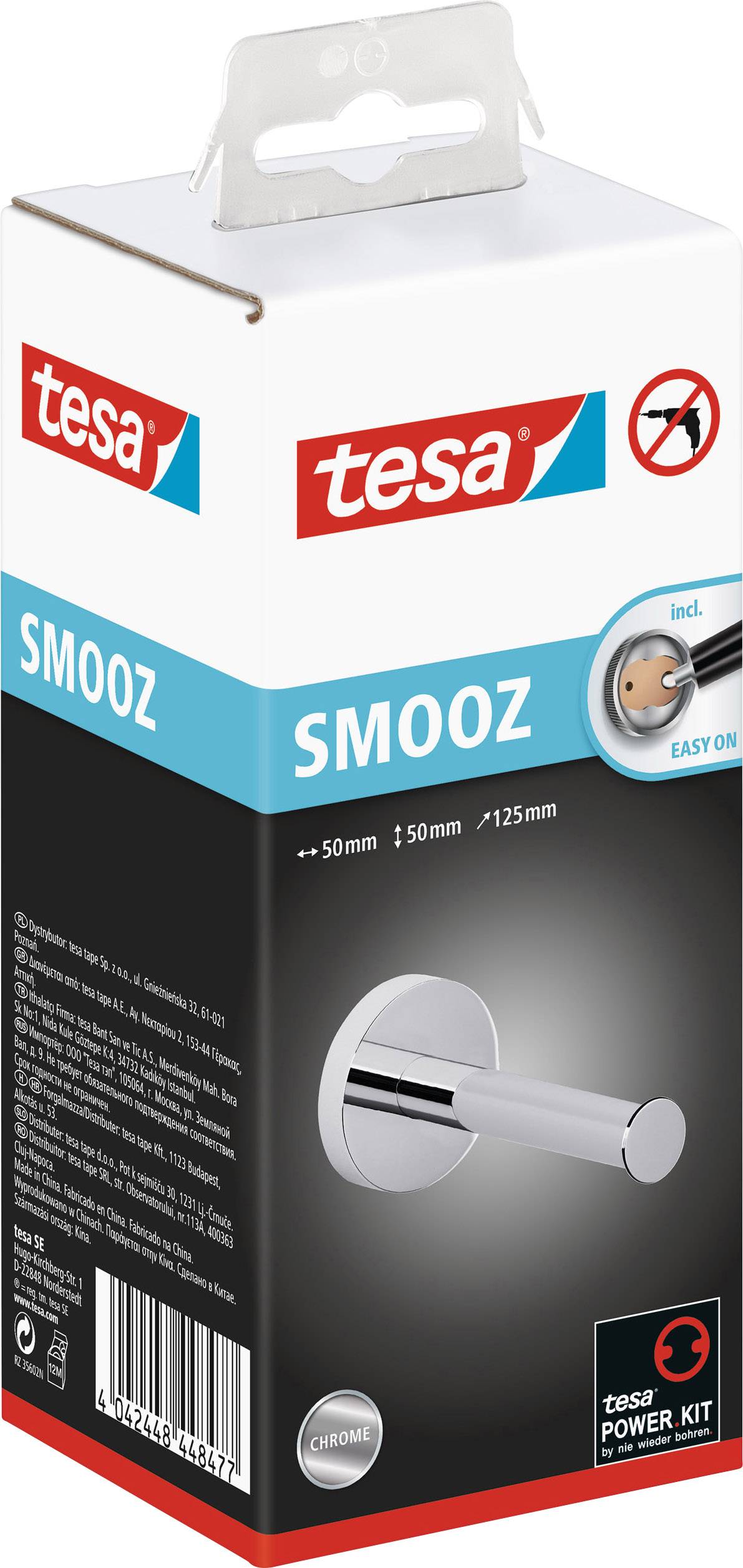 Opakowanie uchwytu na ręczniki tesa SMOOZ w chromowanej stylizacji. Prezentuje zdjęcie produktu i znak firmowy. Prosta instalacja bez wiercenia.