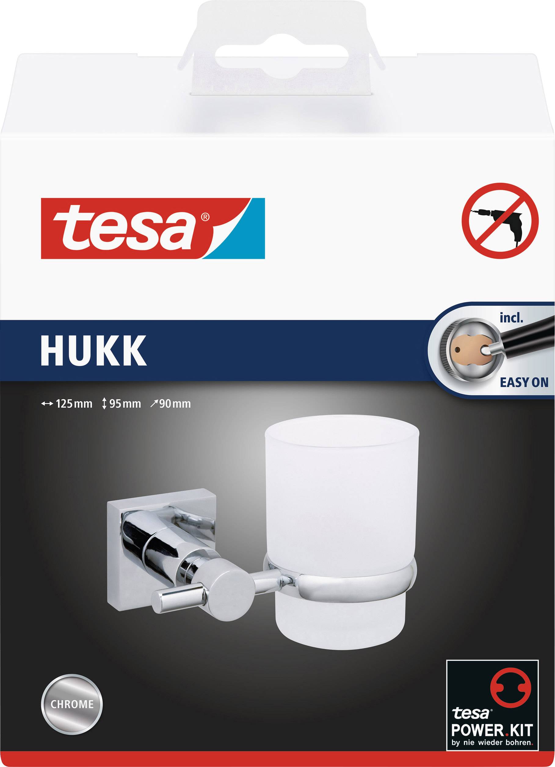 Opakowanie uchwytu na kubek do mycia zębów Tesa HUKK z chromowanym mocowaniem, zawiera zestaw Tesa Power Kit do łatwego montażu.