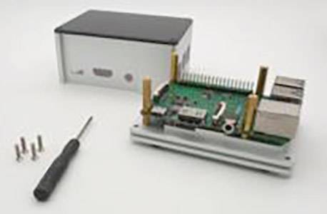 Otwarta obudowa elektroniczna z widoczną zieloną płytką drukowaną i złączami. Obok leży śrubokręt i śruby.