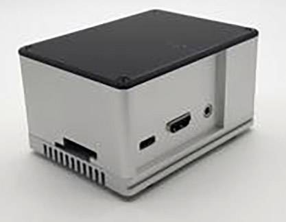 Mały, prostokątny, metalowy pojemnik z czarną górną pokrywą, kilkoma złączami i otworami wentylacyjnymi po bokach, na szarym tle.