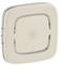 Kwadratowe, kremowe urządzenie z zaokrąglonymi rogami. W centrum znajduje się symbol domu.