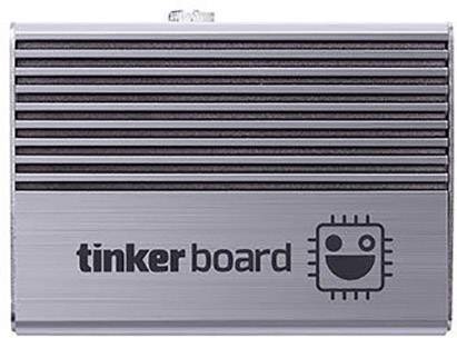 Metalowa obudowa z logo i napisem 'tinker board'. Górna część posiada szczeliny wentylacyjne.