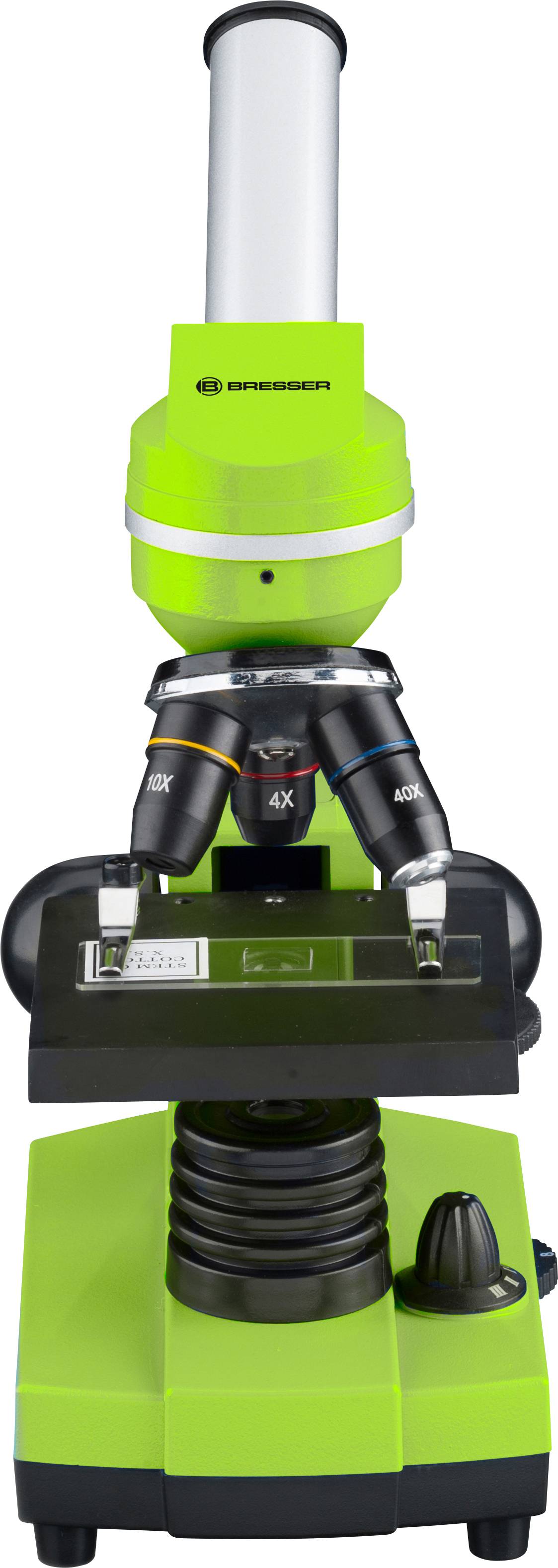 Zielony mikroskop z trzema ustawieniami obiektywów. Przedstawia instrumenty optyczne do powiększania małych obiektów.