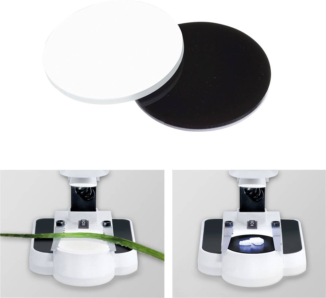 Dwie okrągłe tarcze, jedna biała i jedna czarna, przytrzymywane przez urządzenie. Między tarczami leży zielone ostrze.