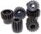 Kilka czarnych kół zębatych o różnych rozmiarach i kształtach leży razem.