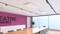 Nowoczesna sala konferencyjna z dużym drewnianym stołem, krzesłami, różową ścianą akcentową z napisem 'Creative Agency' i dużymi oknami.