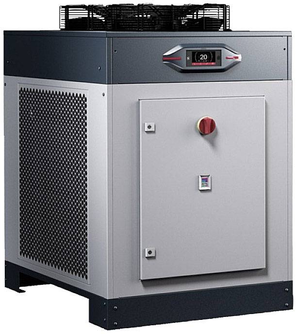 Metalowe urządzenie techniczne z wyświetlaczem na górze, wskazujące temperaturę '20'. Nadaje się do zastosowań przemysłowych lub dużych instalacji.