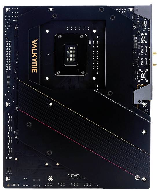 Płyta główna komputera 'VALKYRIE' o złożonym designie. Czarna płytka drukowana, widoczne chipy i złącza. Prostokątny kształt.