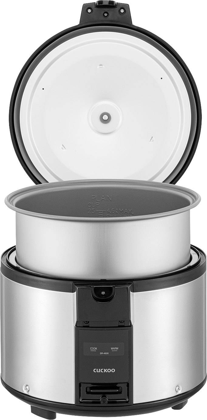 Otwarty garnek do ryżu z wyjmowaną metalową wewnętrzną wkładką, wskazujący na przeznaczenie do przygotowywania ryżu.