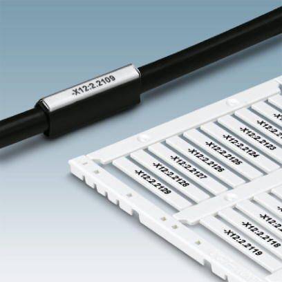 Kabel jest oznaczony etykietą 'X12.2.2109'. Obok leżą podobne etykiety.