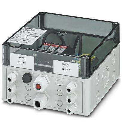 Elektroniczne urządzenie z przezroczystą pokrywą, ukazujące kable i złącza wewnątrz. Odpowiednie do zastosowań w dystrybucji energii elektrycznej lub sterowaniu.