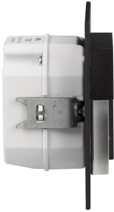 Widok z boku przełącznika elektrycznego z metalowym mocowaniem i czarną płytką z tworzywa sztucznego.