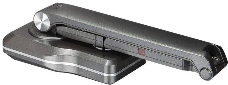 Czarny, nowoczesny mikroskop na prostokątnej podstawie, który wygląda kompaktowo i przenośnie, idealny do użytku w podróży.