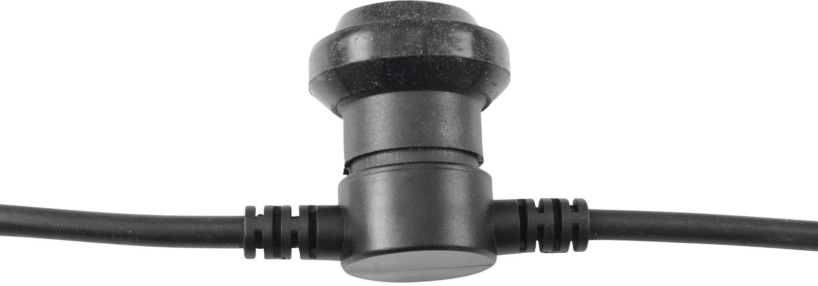 Czarny, cylindryczny rozdzielacz z dwoma podłączonymi kablami. Odpowiedni do elektrycznych instalacji i połączeń.