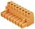 Pomarańczowy, prostokątny złącz z zaciskami do podłączenia przewodów elektrycznych.
