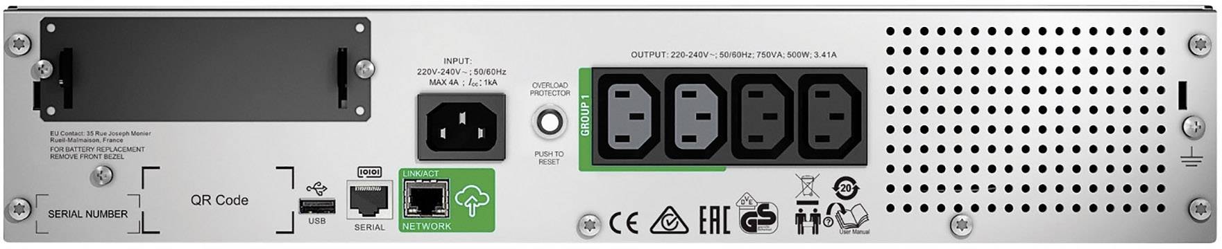 Tylna strona urządzenia elektronicznego z różnymi złączami: złącza zasilania, port LAN, kod QR, numer seryjny i szczeliny wentylacyjne.