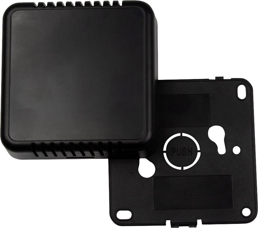 Czarny kwadratowy plastikowy korpus, częściowo otwarty, przedstawiający widok wewnętrzny. Tekst 'PUSH' widoczny od wewnątrz.