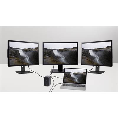 Laptop jest podłączony do trzech monitorów, które wszystkie wyświetlają obraz wodospadu. Monitory stoją obok siebie na biurku.