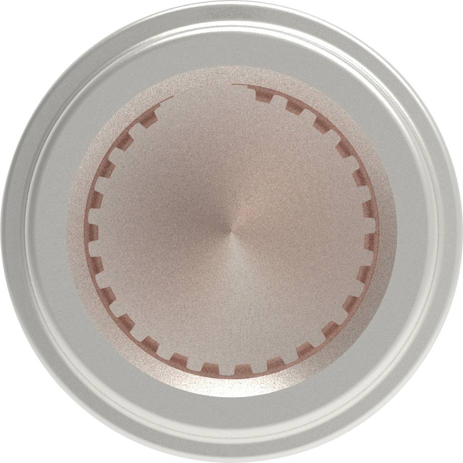 Metalowy, cylindryczny przedmiot widziany od góry, z ząbkowaną krawędzią i wklęsłym, miedzianym środkiem.