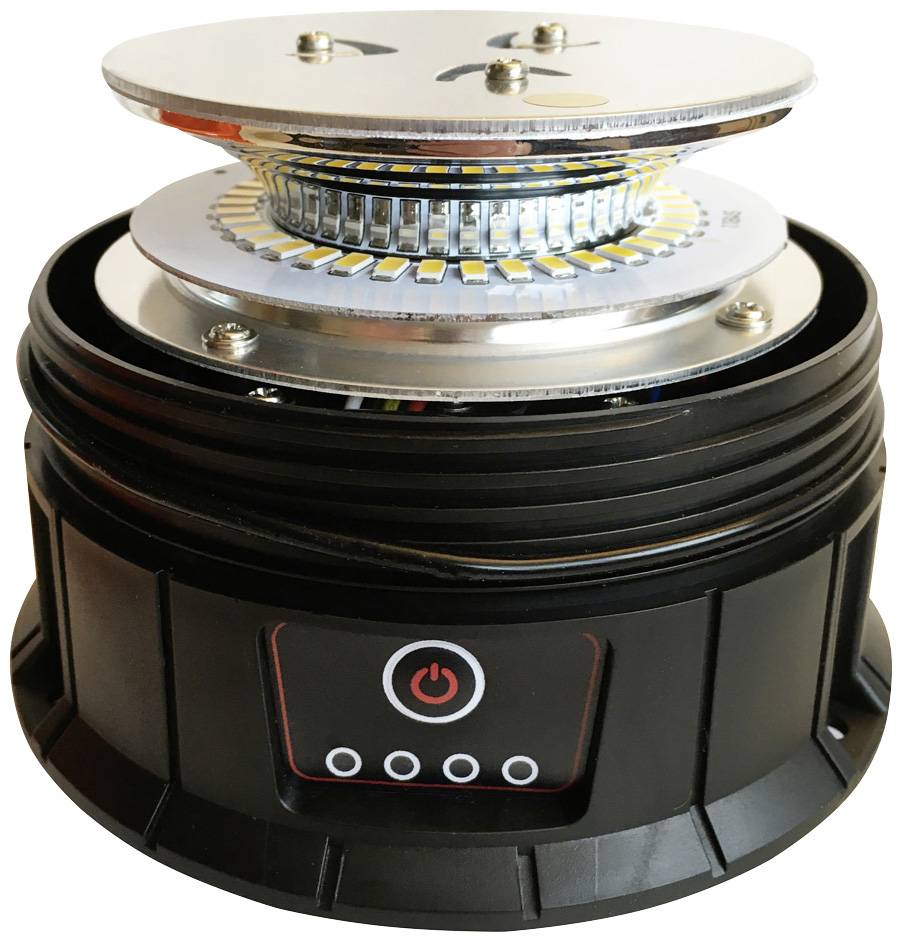 Czarna, okrągła lampa LED z możliwą do zdjęcia metalową górną częścią, ukazująca wewnętrzną strukturę świecenia. Z przodu wyłącznik oraz wskaźniki kontrolne.